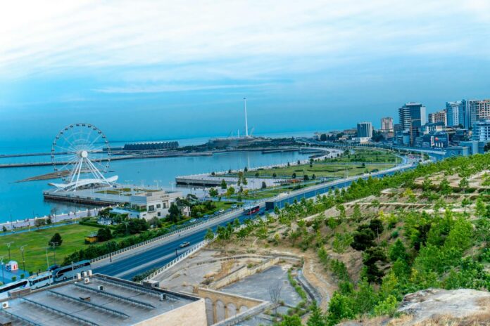 A beautiful cityscape view with a ferris wheel.